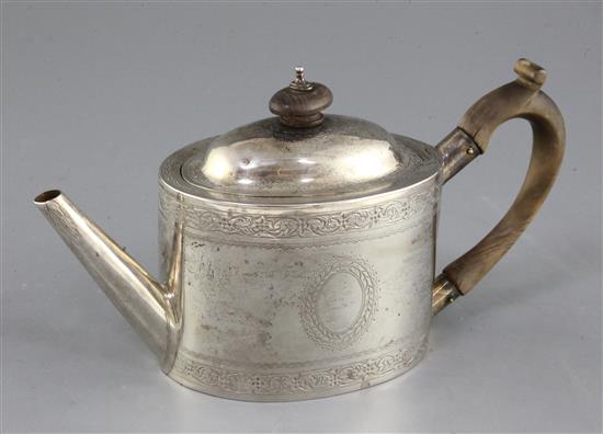 A George III silver oval teapot by Smith & Hayter, gross 14 oz.
